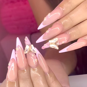 French press-on nails with 3D butterfly and floral art in soft pink stiletto shape