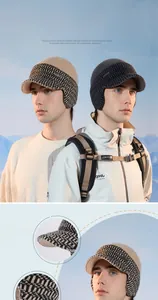 Detailed close-up of windproof 6cm brim and knit ear protection on a winter baseball cap