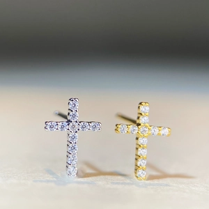 Iced out cross moissanite stud earrings in silver and gold plated finish for a hip hop style