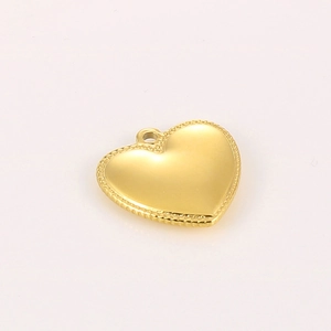 Pendentif coeur doré élégant avec bordure texturée et finition métallique polie