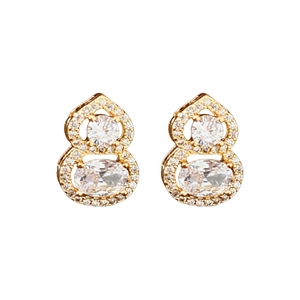 Elegant gold plated gourd-shaped earrings with sparkling cubic zirconia on white background