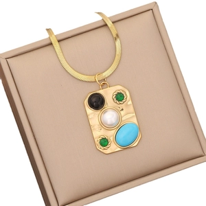 Flat snake chain necklace featuring a turquoise and pearl rectangular metal pendant