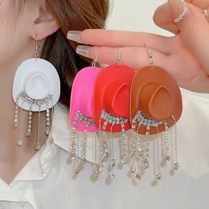 Sparkling cowboy hat rhinestone tassel earrings available in white pink red and brown