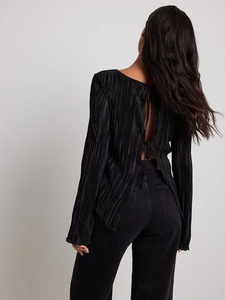 Elegant black plissé long sleeve blouse with back tie detail and flared sleeves