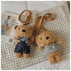 Detail of plush bear crossbody bags with denim overalls and grey hoodie outfits
