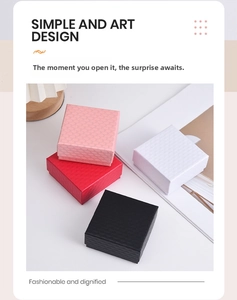 Detail of diamond pattern texture on pink, red, white and black jewelry gift boxes