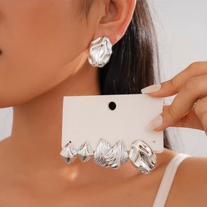 6-piece silver geometric earring set with textured rhombic and organic liquid metal designs