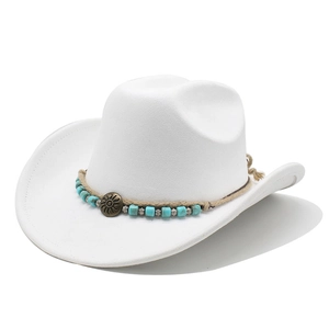 Close-up of white suede cowboy hat with turquoise beads and sunburst buckle decoration