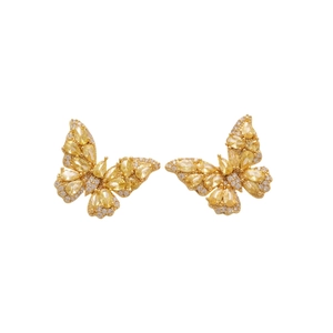 Sparkling butterfly earrings with yellow zircon and fine pavé stones on a clean white base