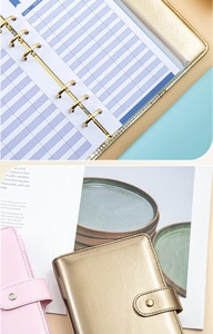 Detail of A6 PU leather budget binder with 6-ring metal binder and interior pockets