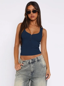 Close-up of navy blue ribbed tank top with four decorative buttons on the U-neckline