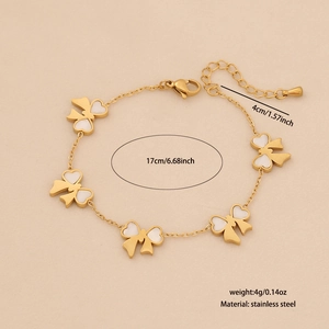 Détail du bracelet papillon doré avec longueur de 17cm et spécifications de taille