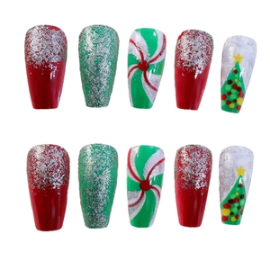Christmas press-on nail set with glitter trees, candy swirls and long coffin shape