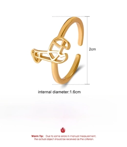 Detailed view of hollow geometric gold ring showing size dimensions and copper material specs