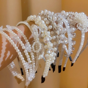 Detail view of pearl and crystal headbands collection for women hair accessories
