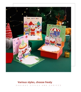 3D Christmas greeting cards featuring cartoon characters on festive green surface