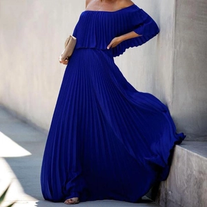 Detail of royal blue off-shoulder chiffon maxi dress with fine pleated fabric texture