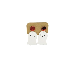 Creative Halloween acrylic ghost earrings with red studs on a kraft card background