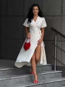 White wrap dress with red heart print, puff sleeves and V-neckline for summer style