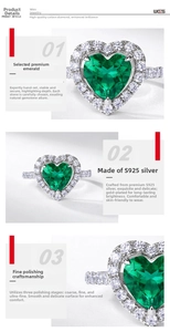 Macro view of heart-cut emerald gemstone on S925 silver ring with fine polishing