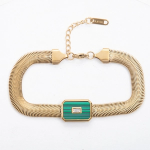 Detail view of gold-plated snake chain bracelet with green striped shell and zircon inlay