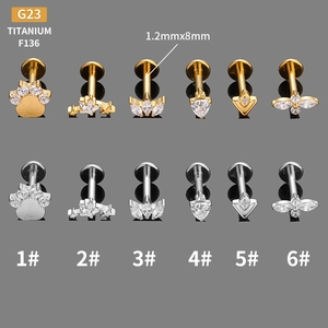 G23 titanium piercing studs in gold and silver with assorted diamond star flower shapes