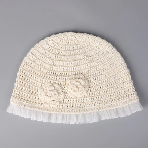 Detail of crochet sun hat with sequins, 3D flowers and pleated lace mesh trim