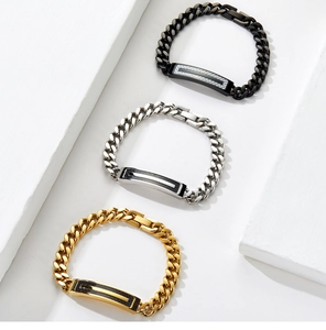 Detailed view of men's Cuban chain bracelets in black, steel, and gold with carbon fiber