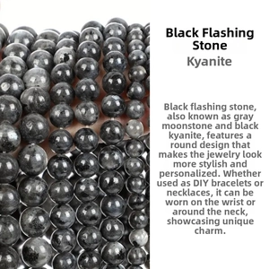 Macro shot of polished black labradorite beads with natural shimmering flashes