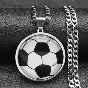 Detailed macro view of the silver stainless steel chain and soccer pendant texture