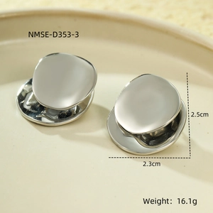 Macro view of silver oval geometric earrings with 2.5cm height and polished finish