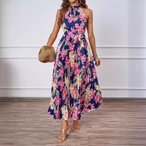 Elegant navy blue floral halter maxi dress with pleated hem and waist tie for summer wear