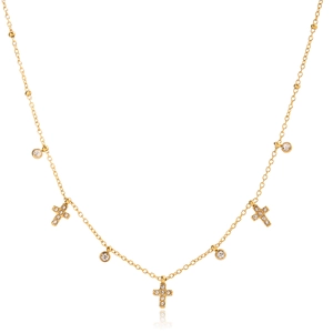 Détail du collier en titane doré avec croix en zircon et pendentifs en pierres rondes