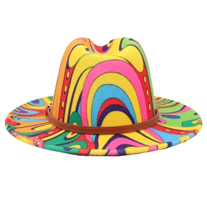 Close-up of Fedora hat featuring colorful psychedelic swirl prints and faux leather belt