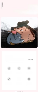 Detail of cute brown and grey cartoon cat hair claw clip on black hair background