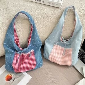 Detail of canvas tote bags with bow patterns, lace-trimmed plaid pockets and drawstring ties