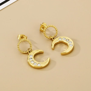 Gold moon stud earrings with sparkling cubic zirconia on a minimalist crescent drop