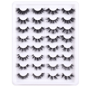 Set of 16 pairs of handmade faux mink eyelashes with fluffy thick curls on white tray