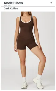 Detail view of dark coffee cross high waist yoga set with contrast piping and V-neck top
