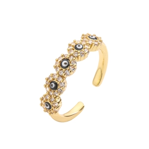 Adjustable gold evil eye ring featuring micro-pave cubic zirconia and colorful enamel inlay