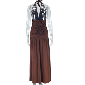 Detail of coffee brown halter maxi dress featuring side pleats and waist ruching details