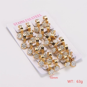 Detail of 10mm gold stainless steel hoop earrings with crystal pavé charms on a card