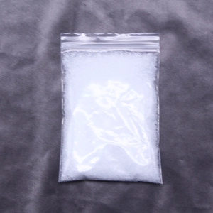 Close-up of artificial dry snow powder in a clear sealed bag for Christmas decoration