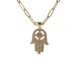 Golden Hamsa Hand necklace with zircon stones and trendy paperclip chain on white background