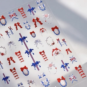 3D embossed nail art stickers featuring vintage bows, pearls, and flowers in red and blue