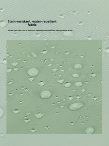 Close-up of waterproof nylon fabric with water droplets on green fitness bag surface