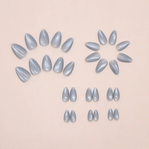 Detail view of almond-shaped cat-eye press-on nails with grey pearlescent finish