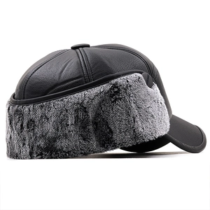 Men's winter flat top hat with ear flaps in black leather and warm grey faux fur lining