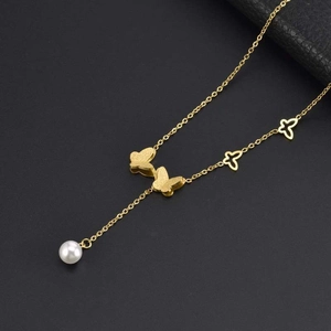 Elegant gold titanium steel necklace featuring butterfly charms, flowers and white pearl