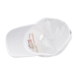 Detail of 100% cotton white baseball cap interior with US eagle embroidery and metal buckle